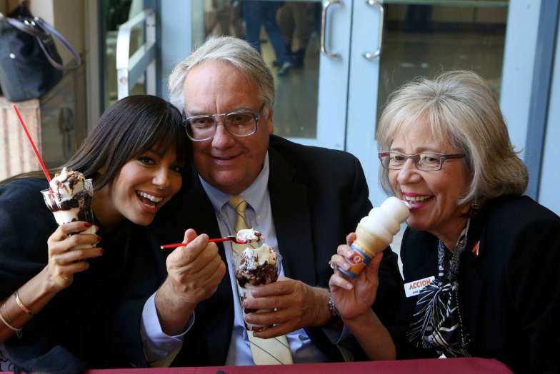 Eva Longoria, Howard Buffett and Accion Texas Inc., President CEO Janie Barrera pose with ice cream at the Rivercenter Mall after making a stop at Dairy Queen after the Accion 20th anniversary kick off luncheon on Friday April 4, 2014. Longoria, Buffett, son of billionaire Warren Buffett, spoke at the luncheon at the Marriott Rivercenter Hotel. The Eva Longoria Foundation and the Howard G. Buffett Foundation have joined with Accion Texas to create a new small business loan fund for Latina entrepreneurs in Texas. Since 2013 the fund has made 58 micro loans totaling more than $500,000.